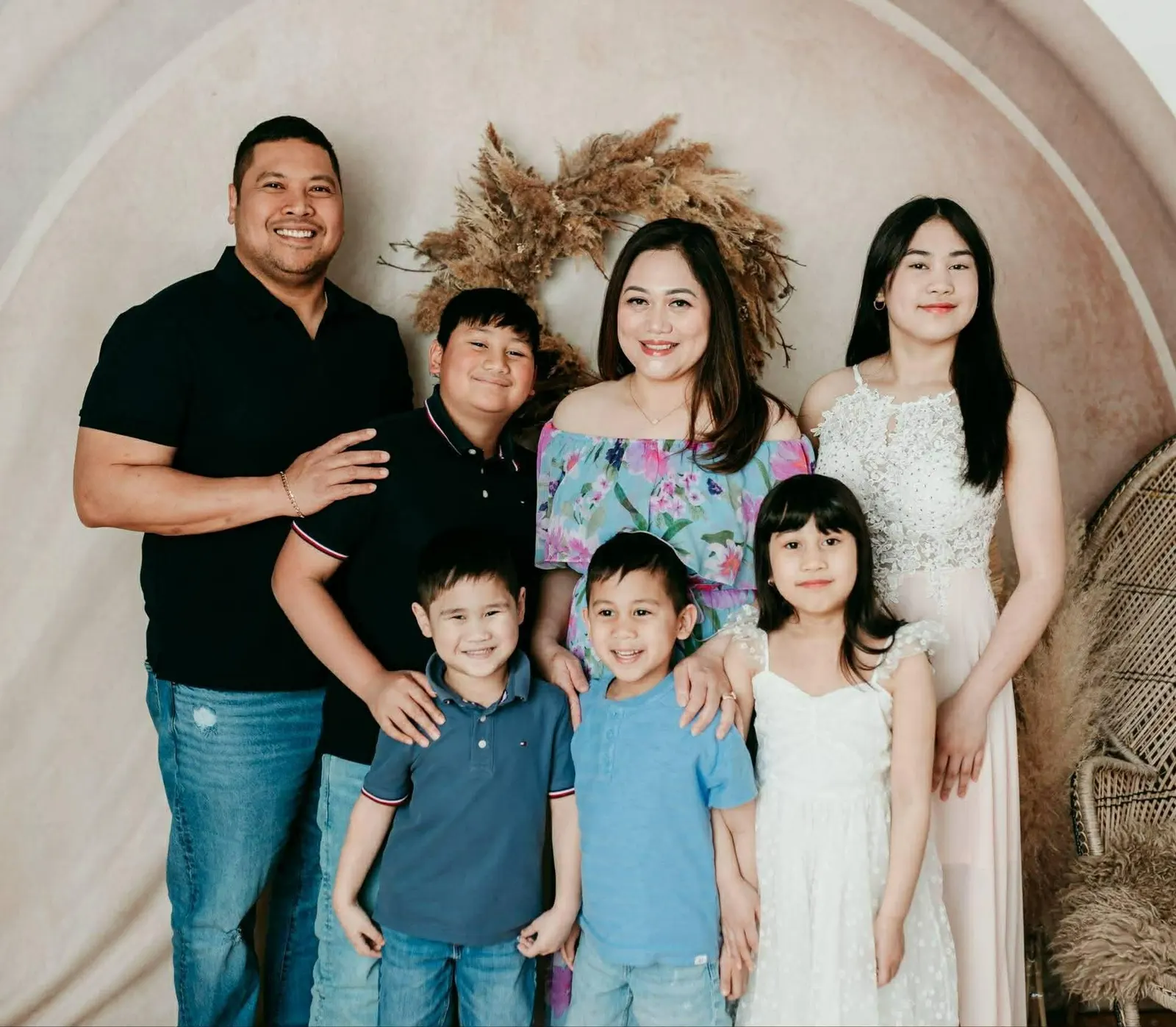 Mark Requinta with his wife and their five children
