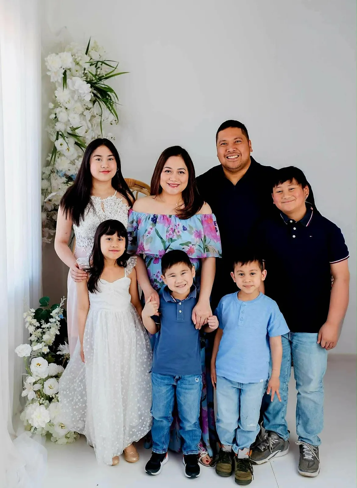 Mark Requinta with his wife and their five children
